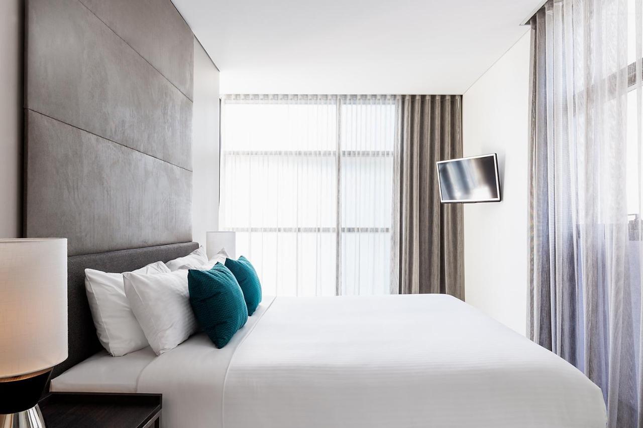 Fraser Suites Sydney Esterno foto A bedroom at the hotel